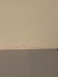 Cracks all over the room.