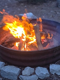 Private fire pit right outside of cabin