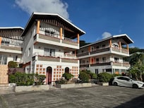 Gem Holiday man building