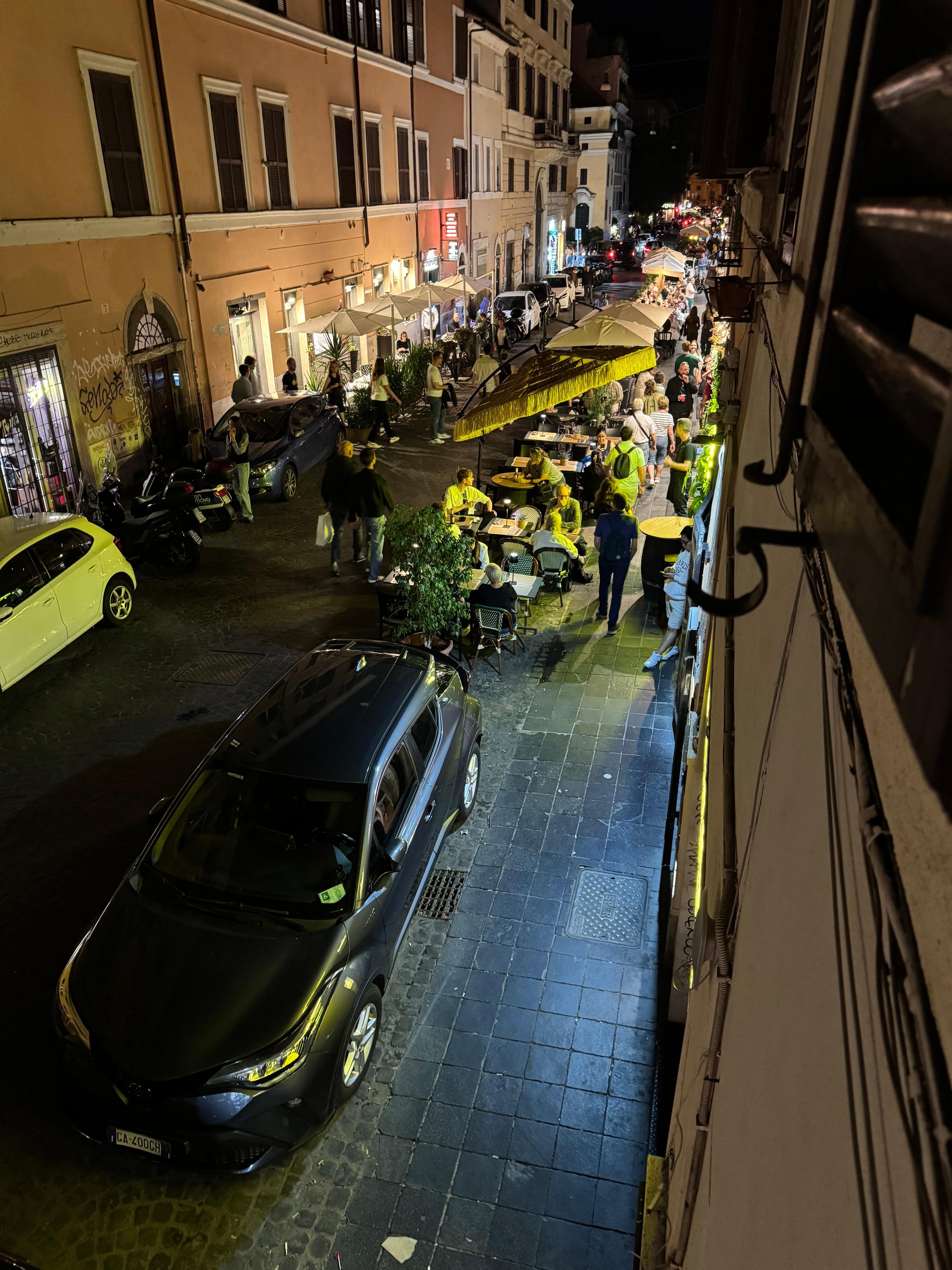 Looking out window at evening on the street 