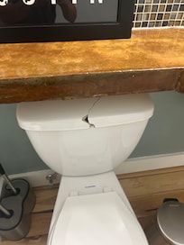 Cracked toilet tank cover