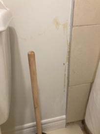 Filthy walls in bathroom