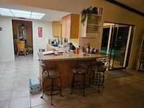 View from the right side of the house, looking towards the kitchen and master bedroom.