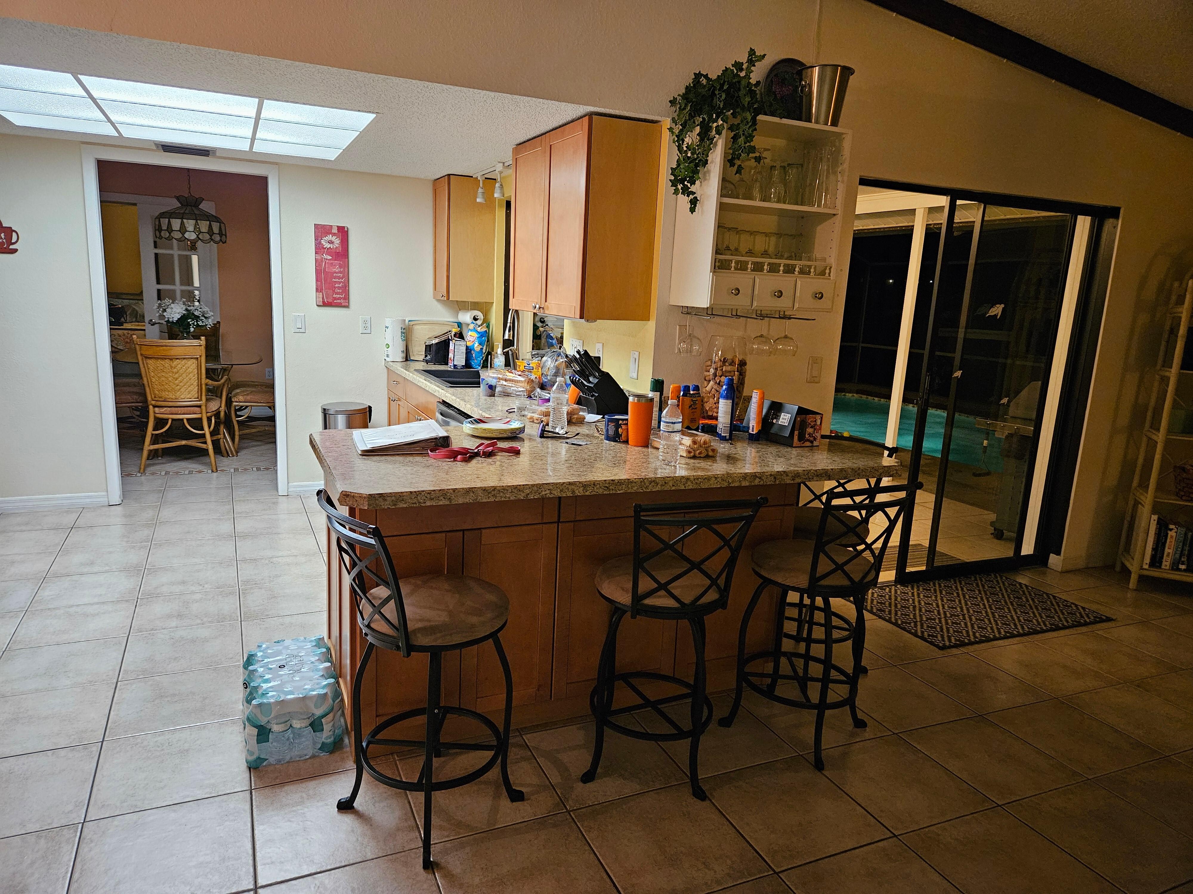 View from the right side of the house, looking towards the kitchen and master bedroom.