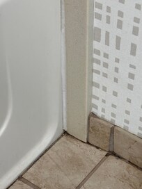 Dirt piled up in corner