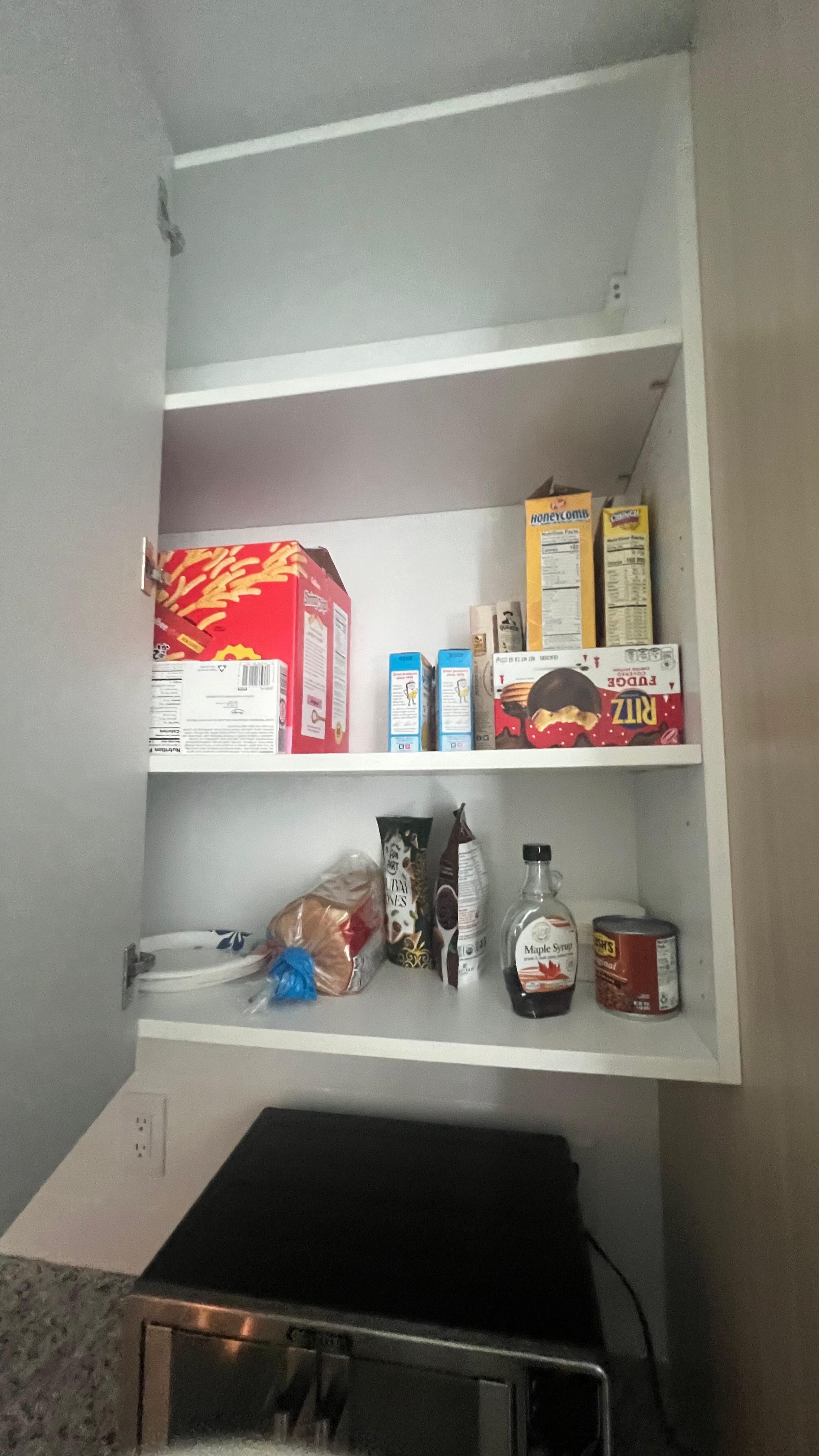 cabinets full of food from previous guests