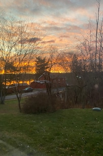 Sunrise from the front living room window.