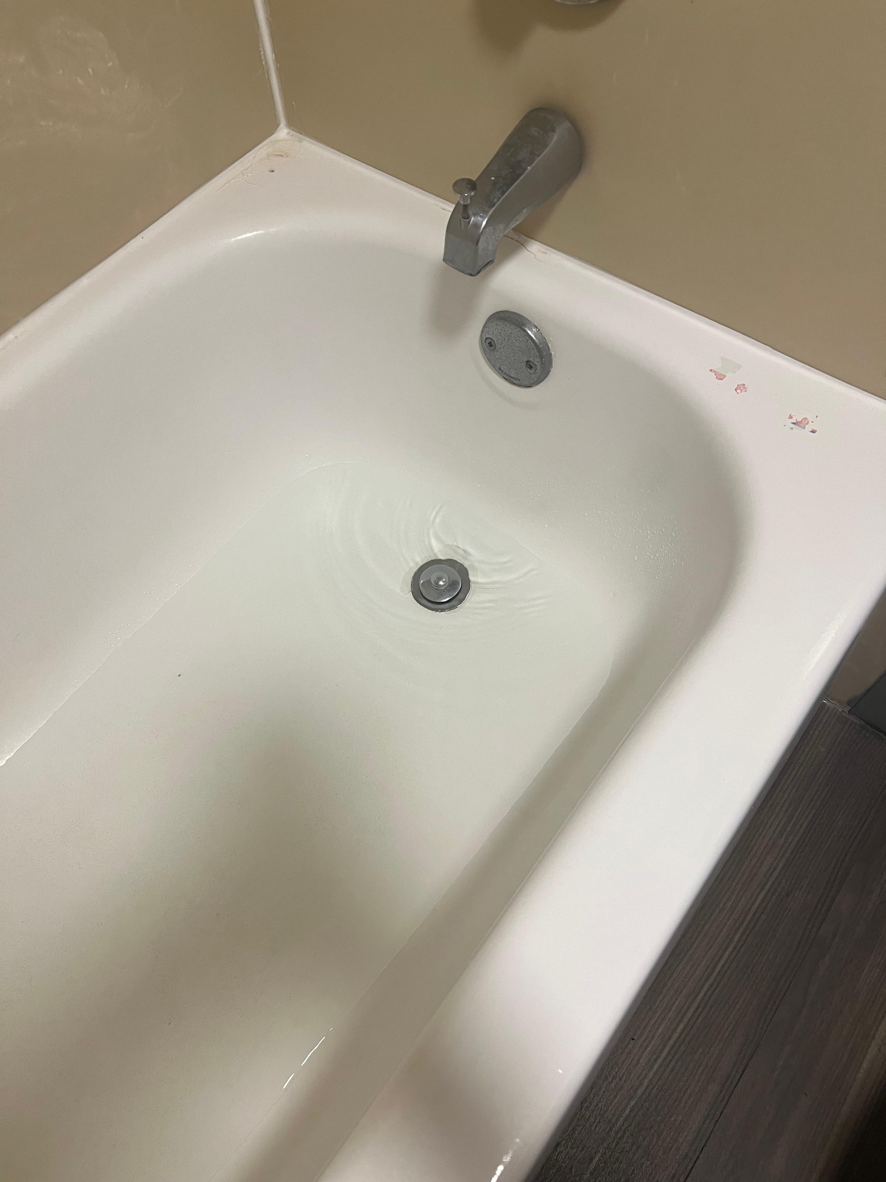 Tub leaning with water pooling up