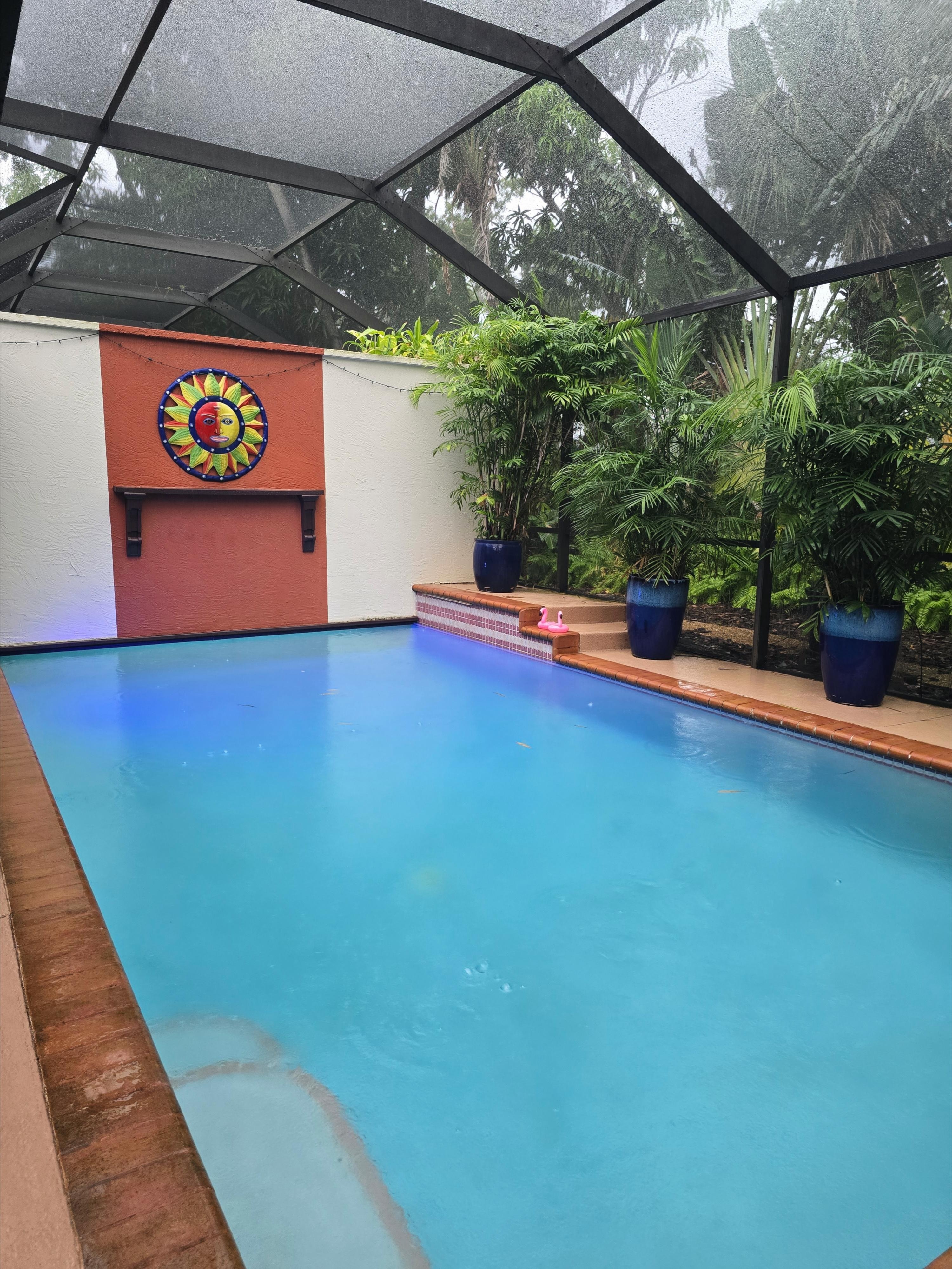 Screened in and private pool