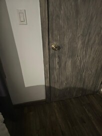 Door knob to the hotel room which could easily be picked, kicked down.