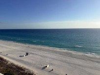 View of the beach from the balcony looking toward the east.