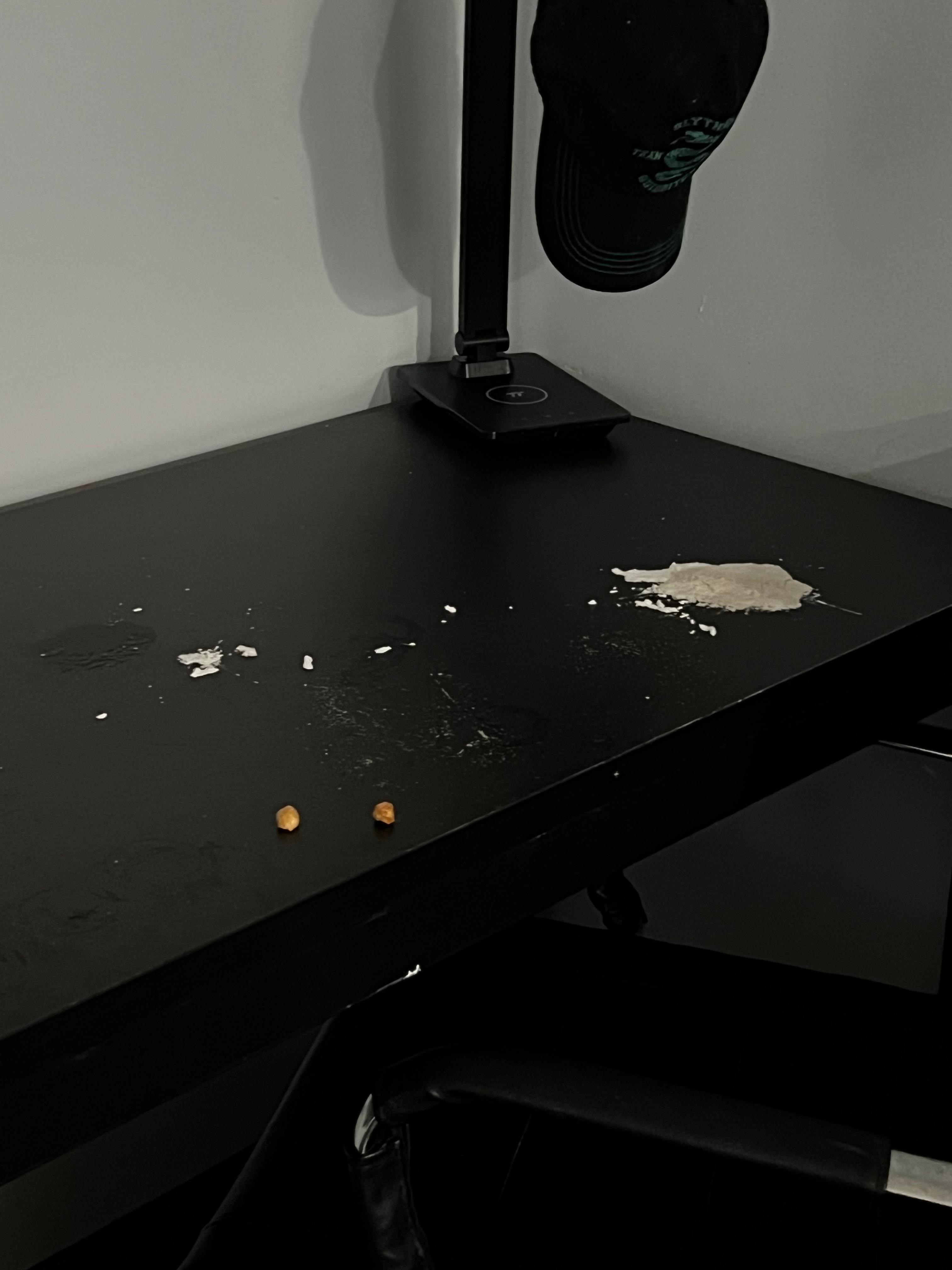 Pieces of ceiling that fell onto desk