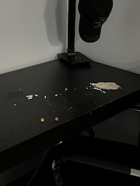 Pieces of ceiling that fell onto desk