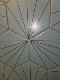 Mouldy bathroom grout.