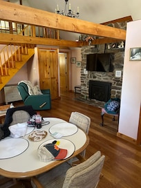 Kitchen and living room with stairs to the loft