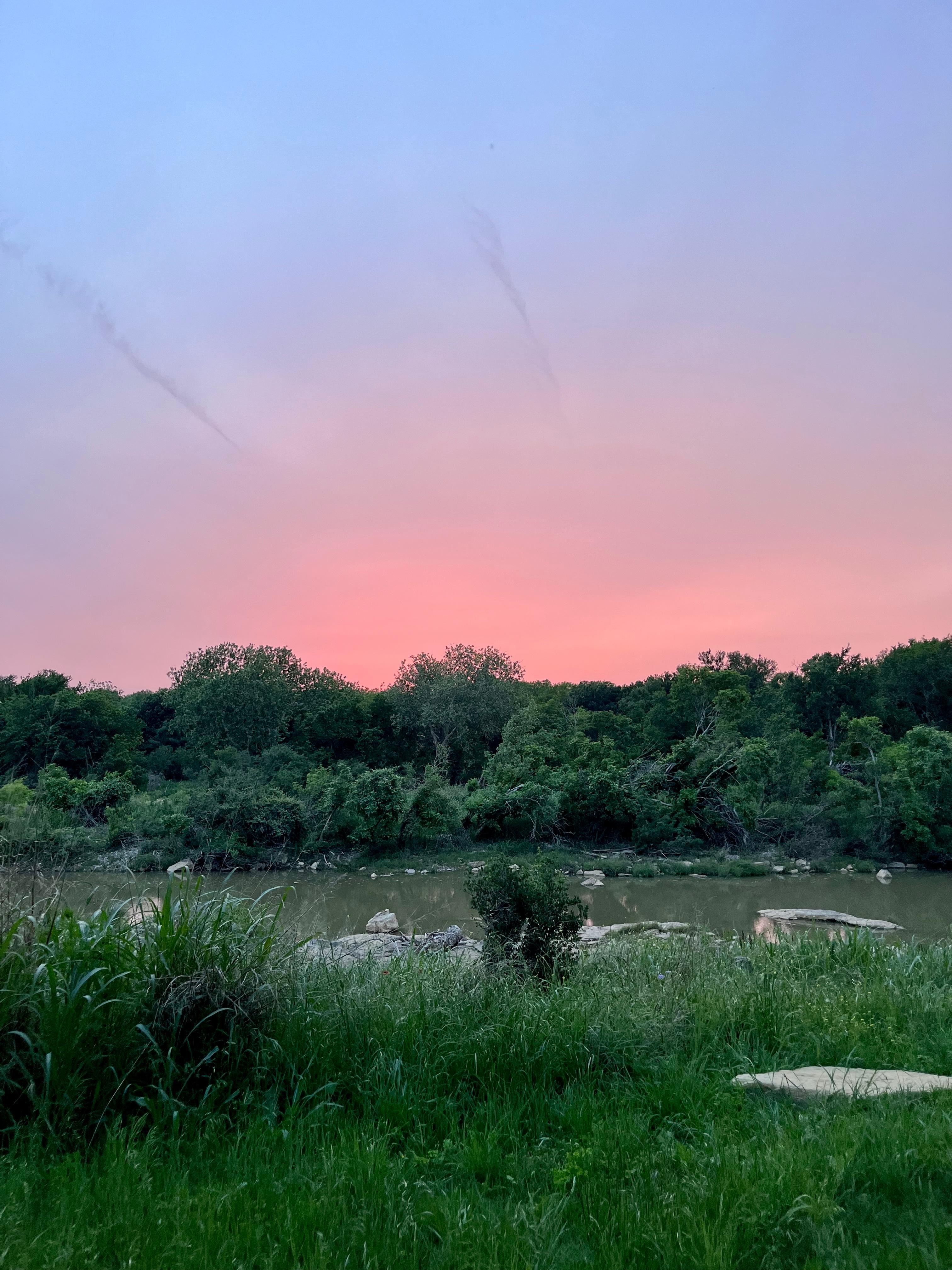 Out back…Sunset over the river. 