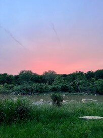 Out back…Sunset over the river.