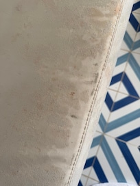 Molding couch that had paint rubbing off as they tried to paint over it