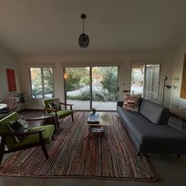 Super cute living room with so much natural light