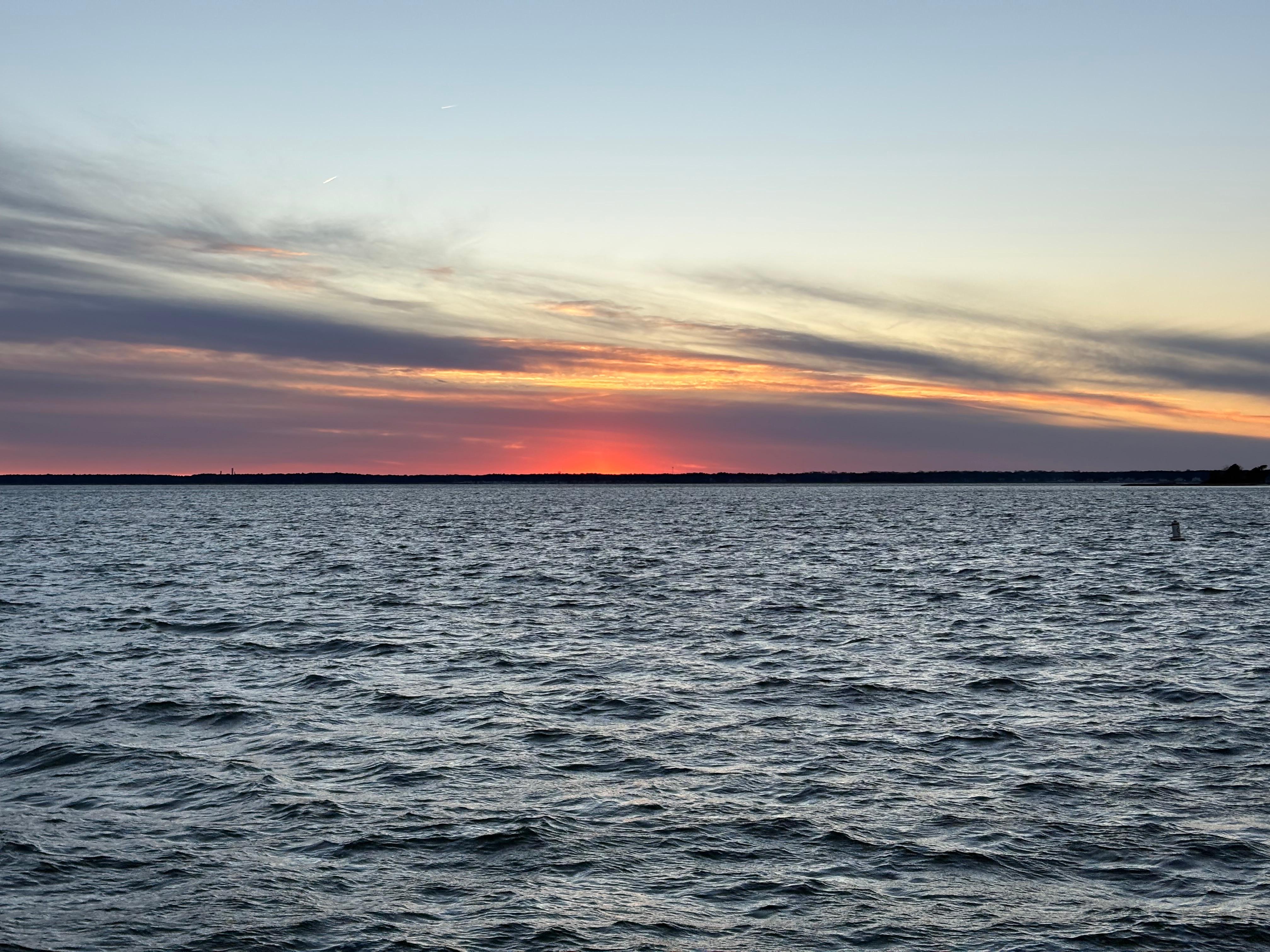 Worth crossing the highway to see sunset on the bay a block from the house