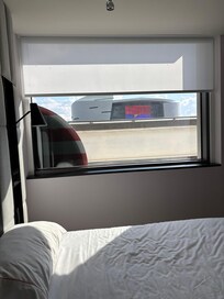 The metro line runs right past the window obscuring the great view beyond