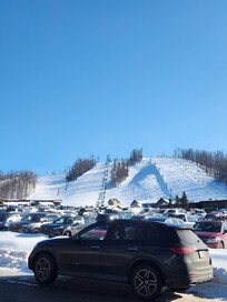 Standing in the driveway, we are DIRECTLY across from parking lot of Nubs Nob. Just walked over.