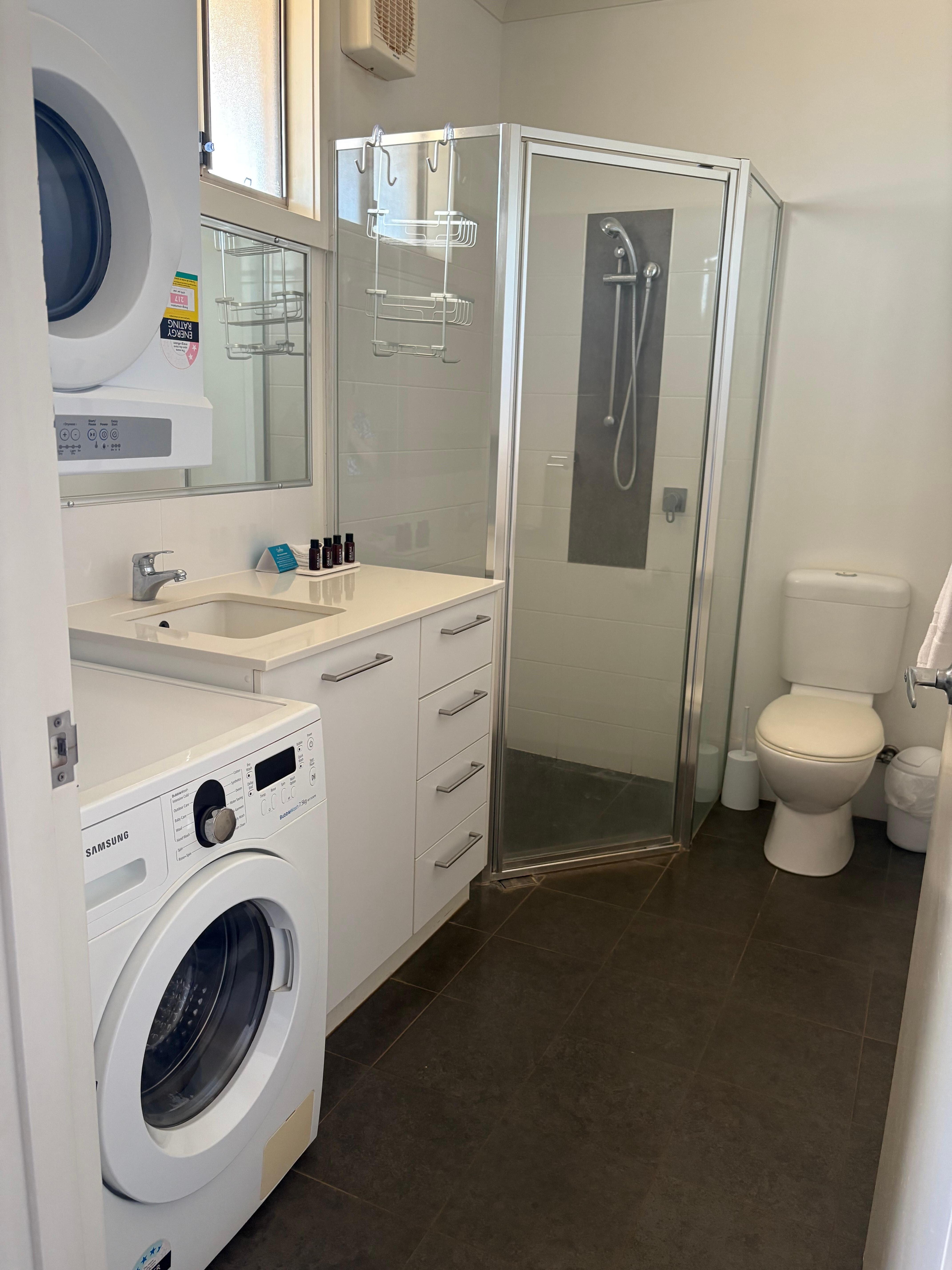 Bathroom with washing machine & dryer