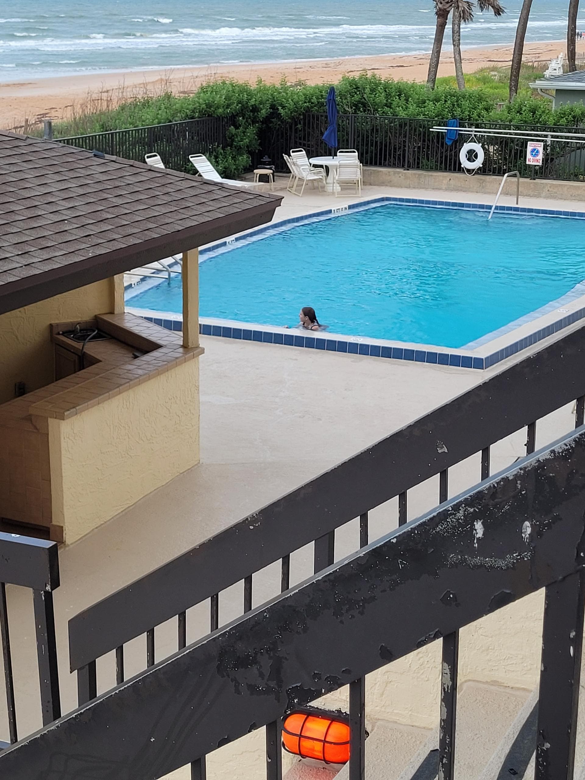 View from balcony to the pool area