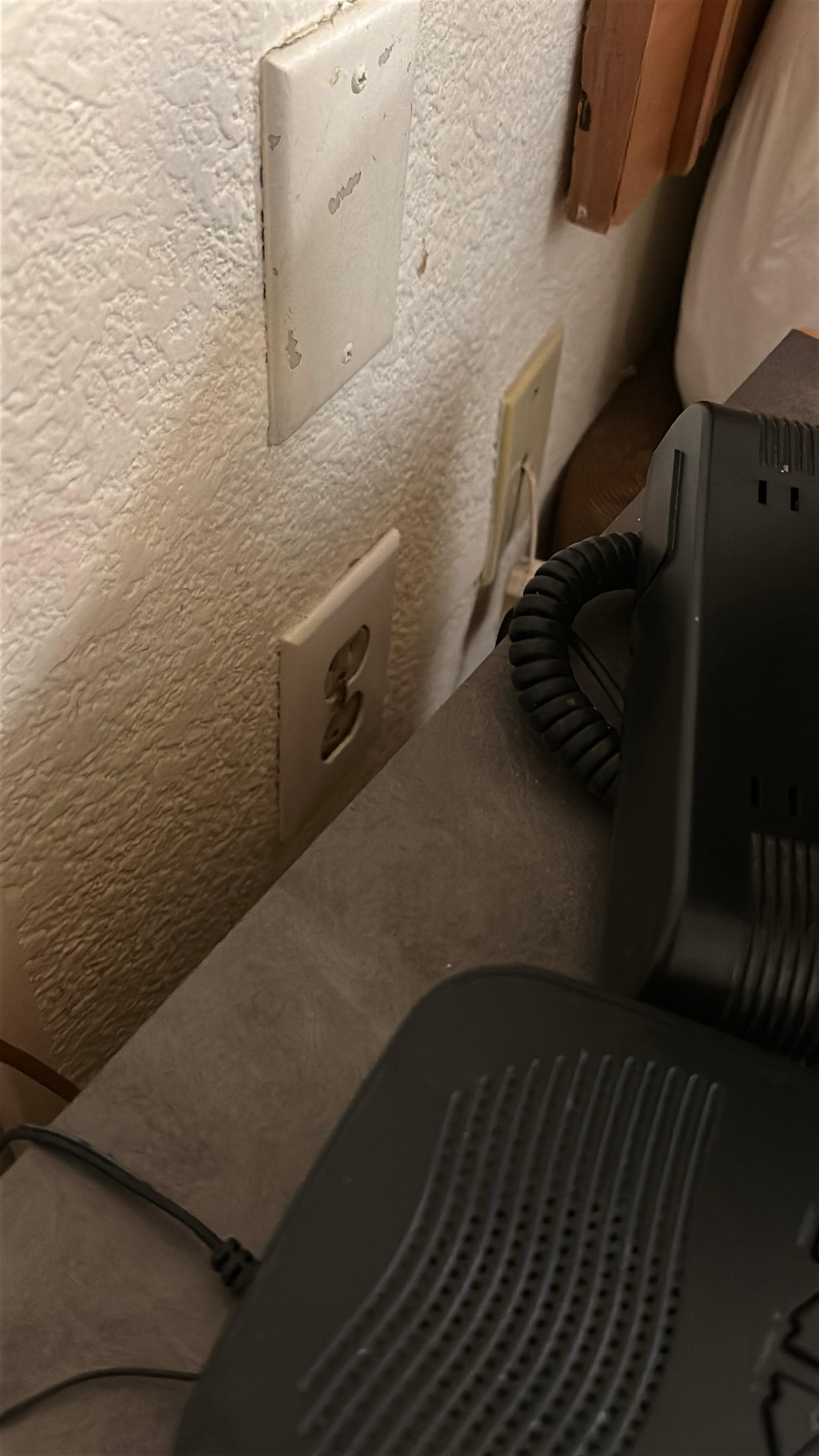 Cockroaches behind bed 