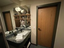 Sinks located outside the bathroom