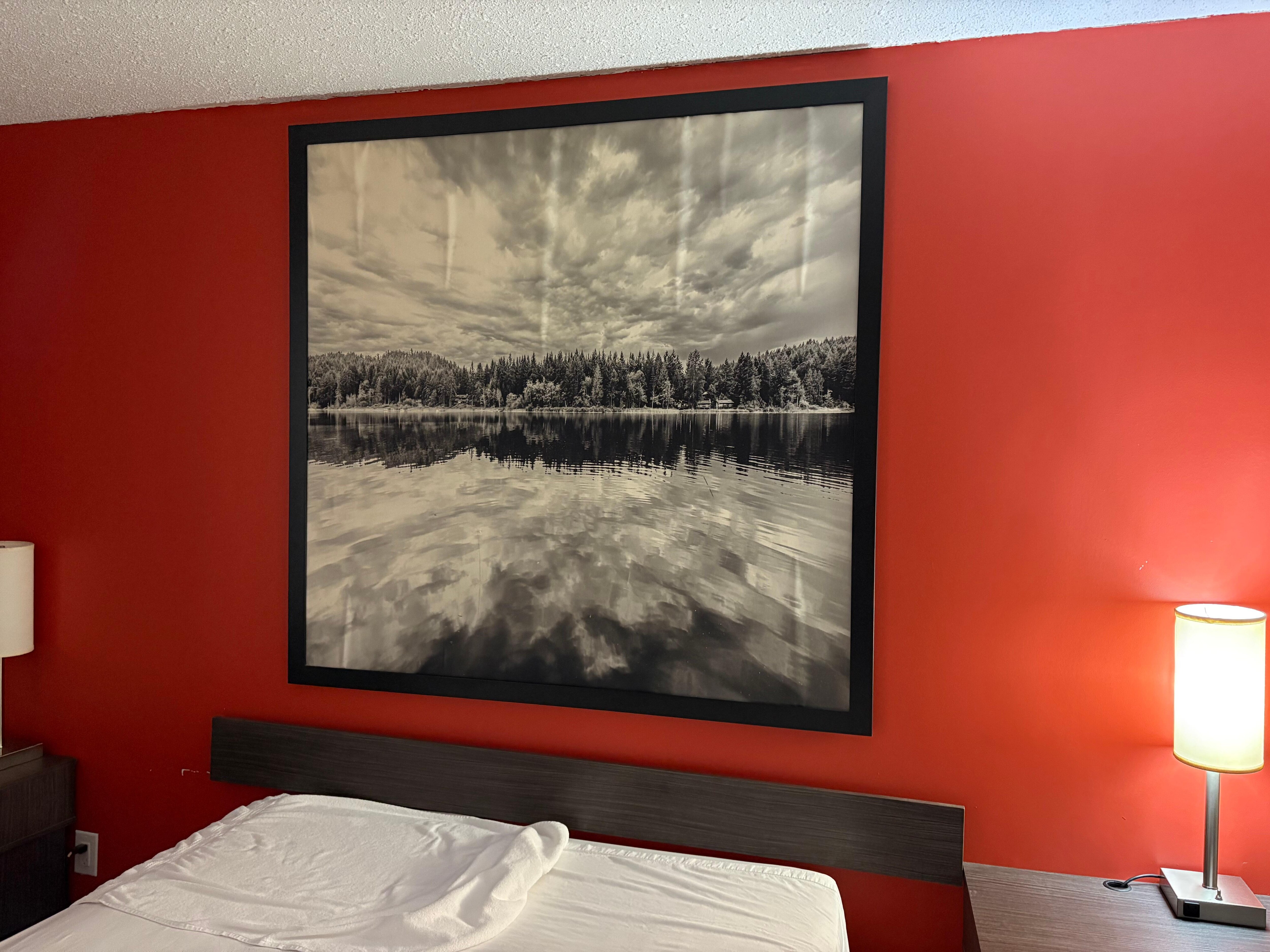 Picture looked like it had water damage, bed very old, dirty & uncomfortable