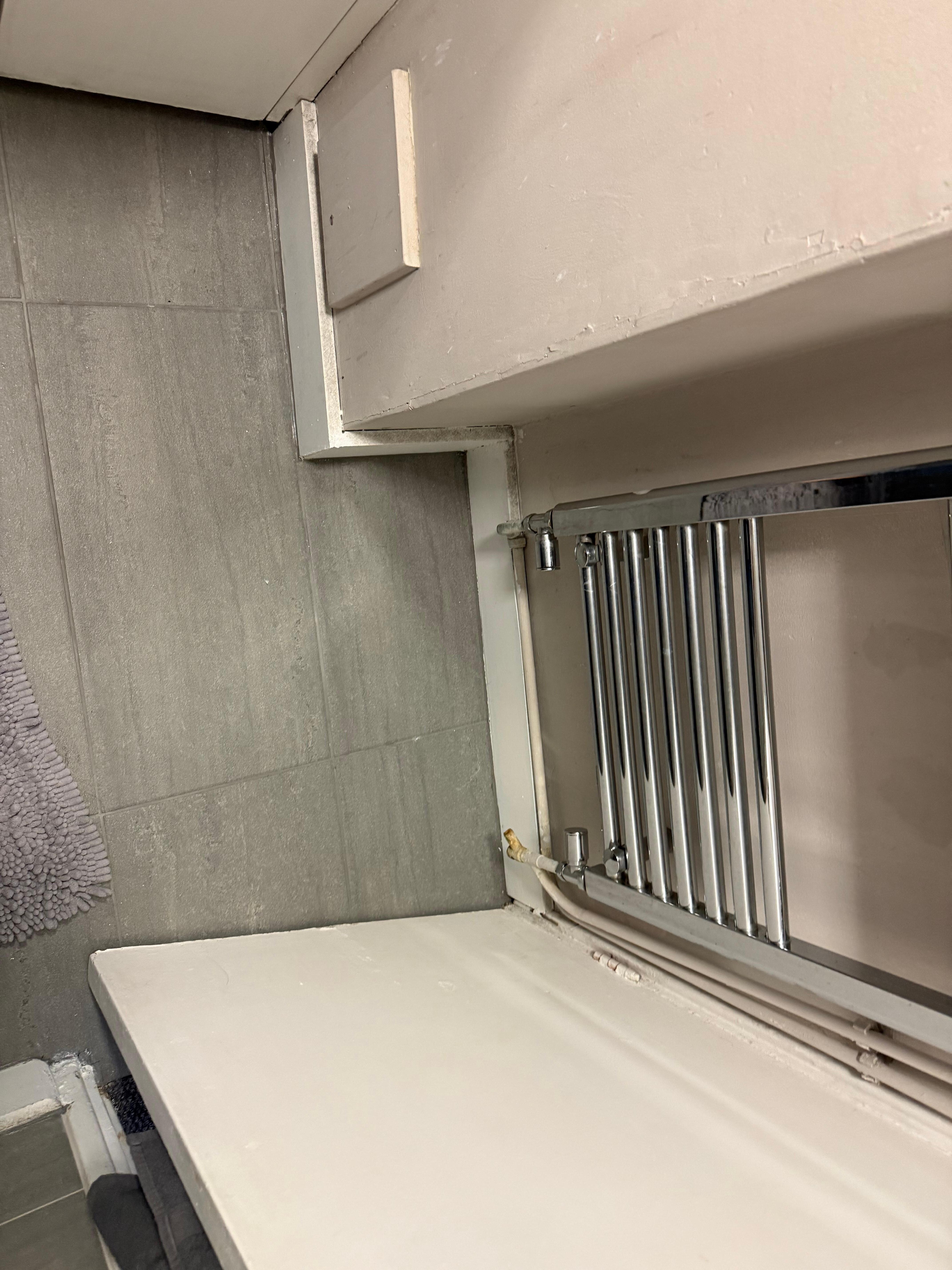 Renovated bathroom looki g down, dirty architraves etc
