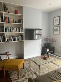 Living room. Once you figure out how to work two remotes, watching the TV is easy.