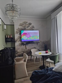 Living room area with table.