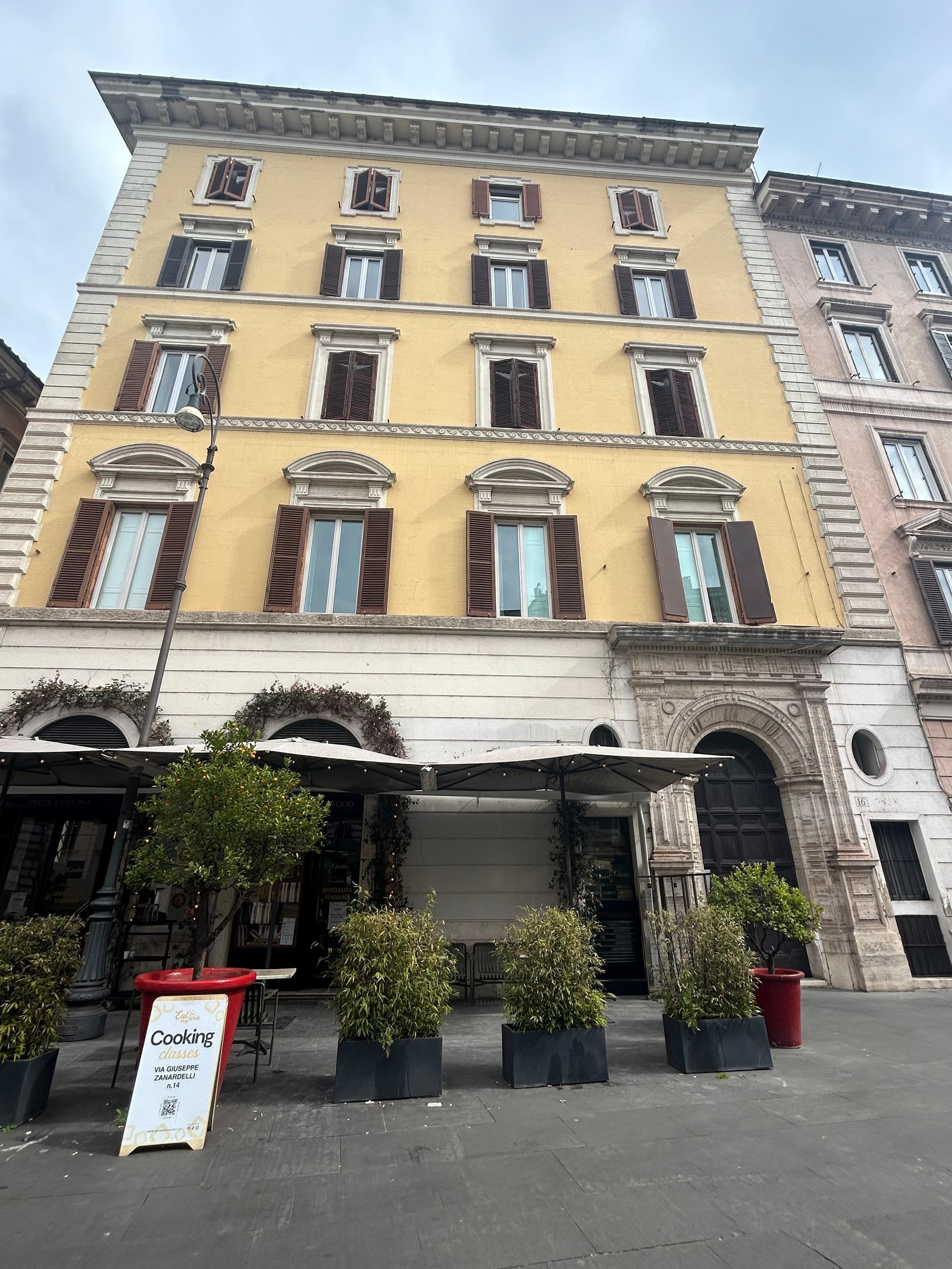 Outside of the apartment building. 