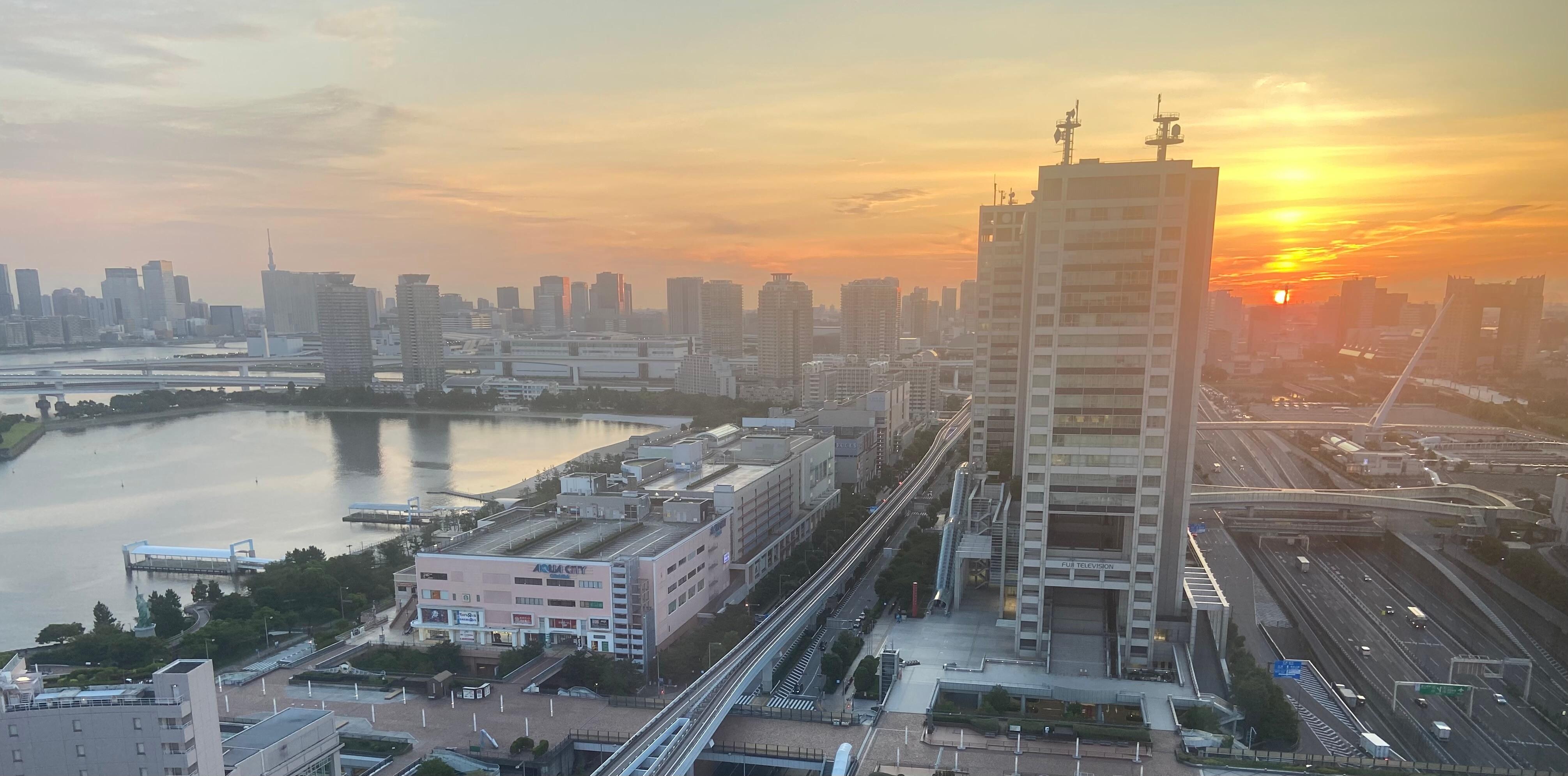 The view from our room of the sun rising in late July