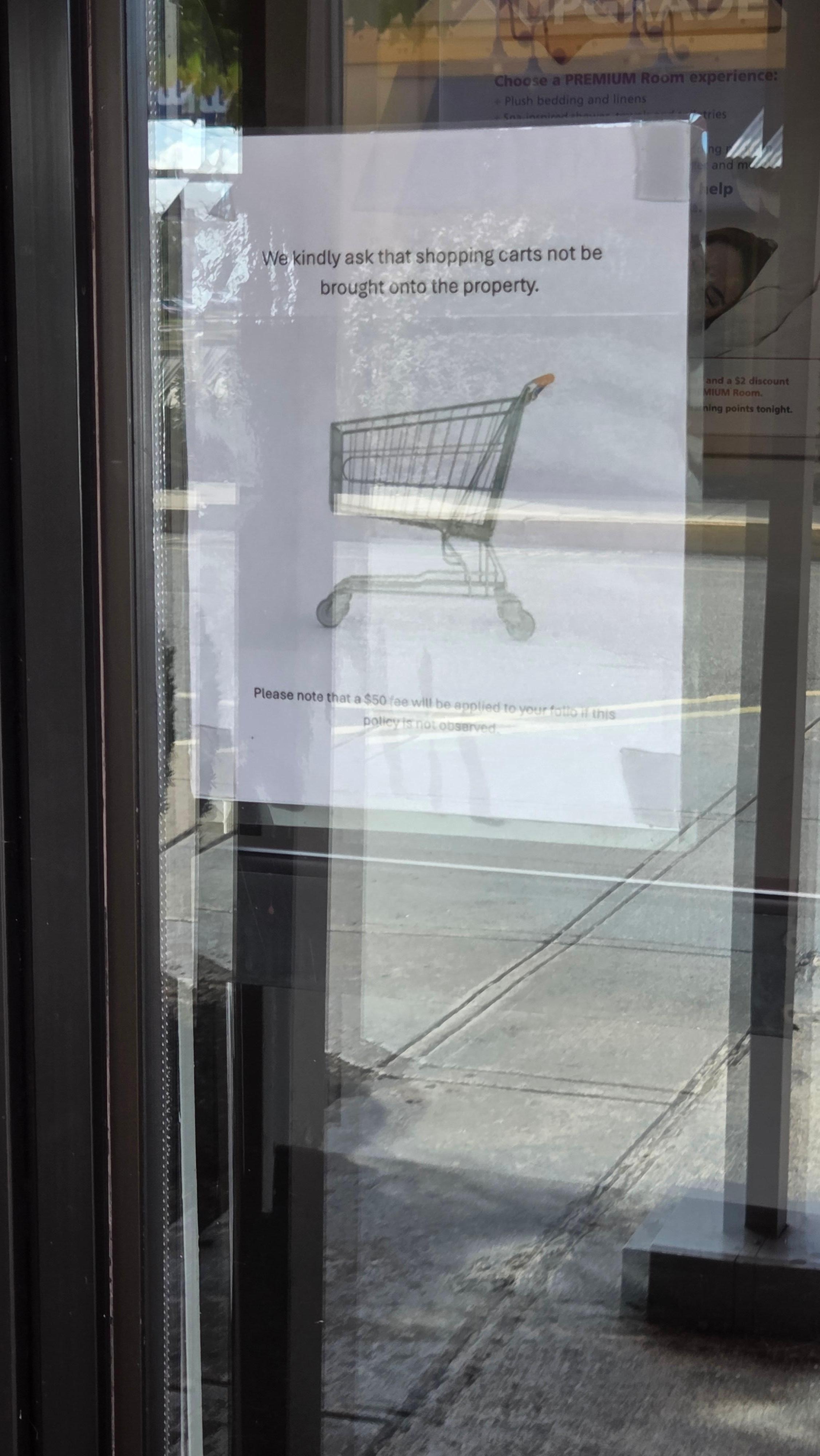 Sign regarding grocery carts. 