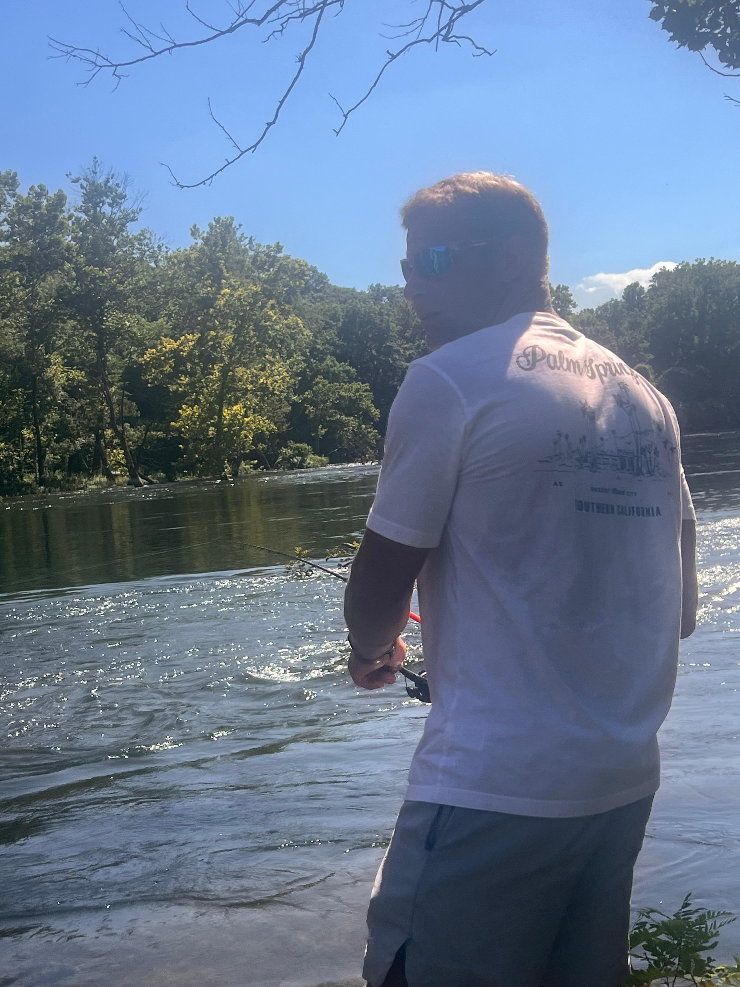 Husband Fishing outside the condo 