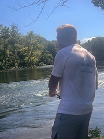 Husband Fishing outside the condo