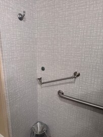 Towel bar unattached from one support