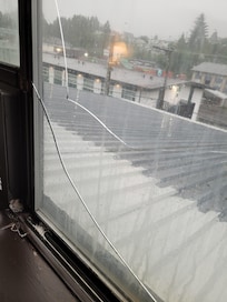 Crack right across window, when touched you could feel the cracked edge. The fan was filthy didn't want to turn it on it faced the beds in the room. Hallway fans just as dirty. Old run down building filthy on the outer side of building
