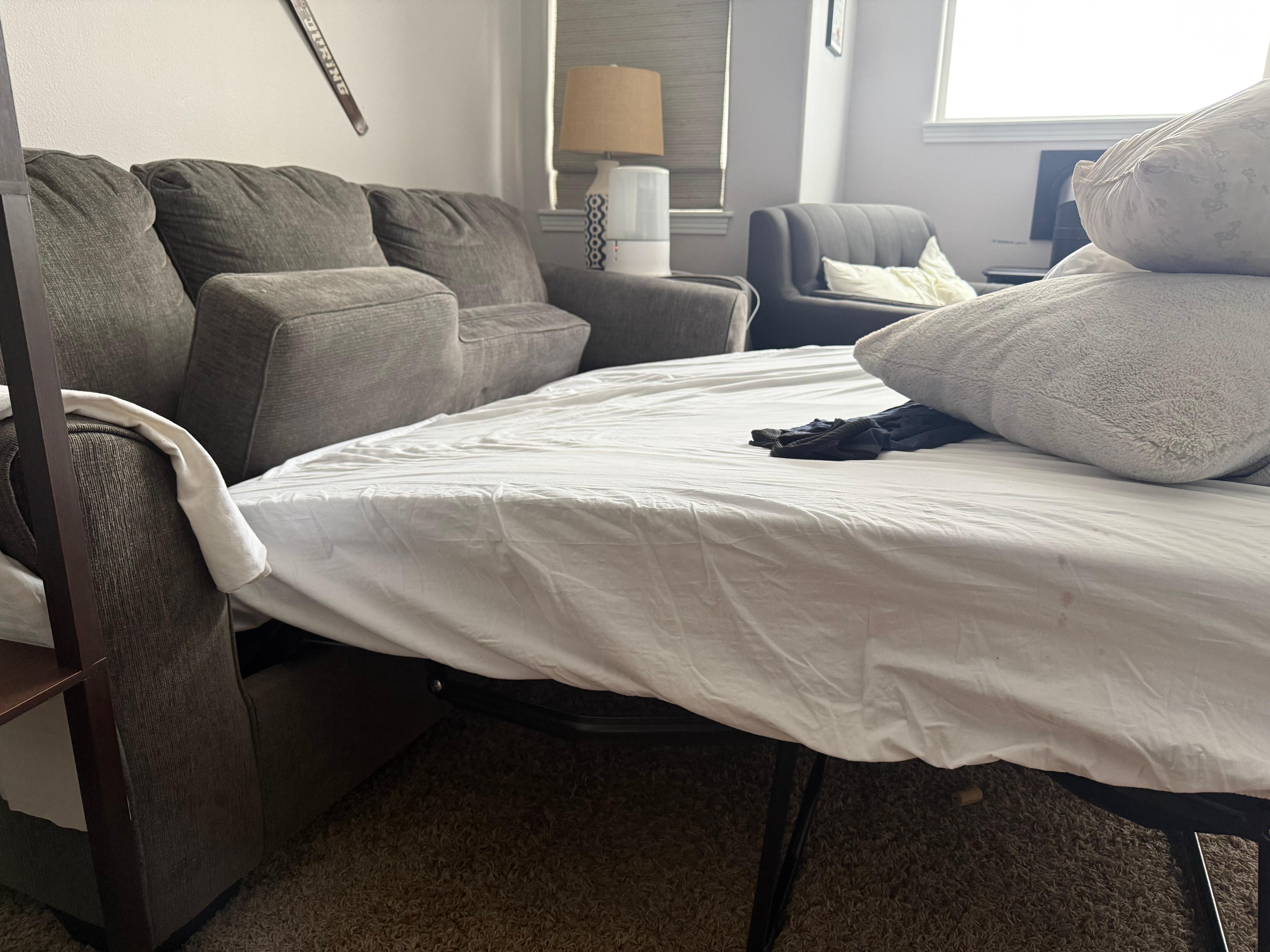 Broken sofa bed (head is 15 inches lower than feet and does not close)