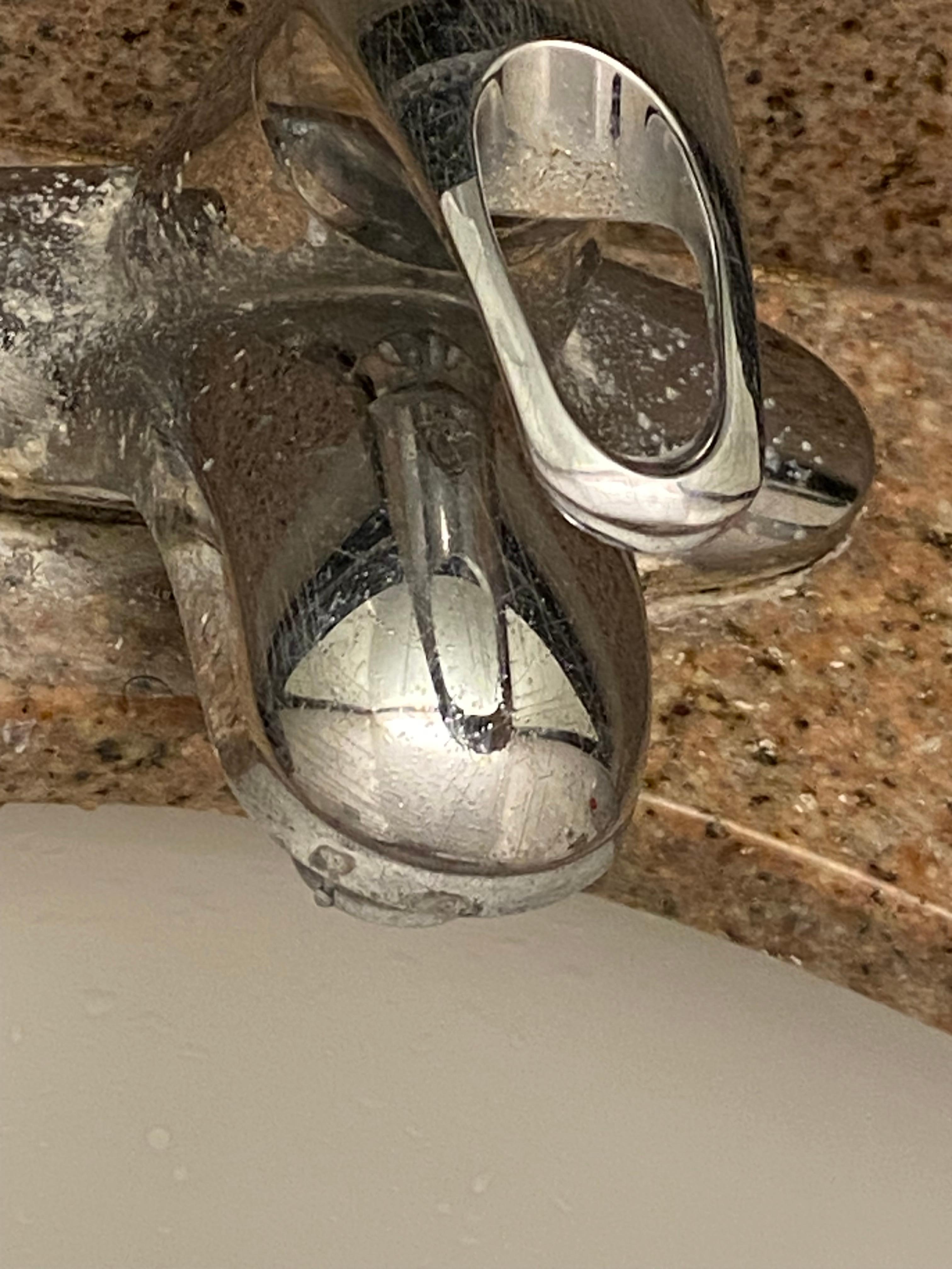 Filthy bathroom faucet