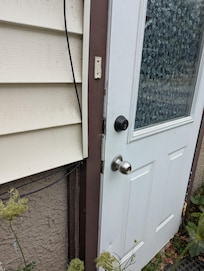 Exterior side door not locked and visibly open