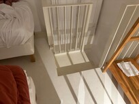 Camouflage death step. You can see how near you must step by it to squeeze between the beds. Tough work at night. We tripped many times.