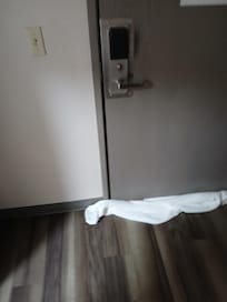 door would not close properly allow light to enter the room from the sides and bottom. had to slam it to engage the latch