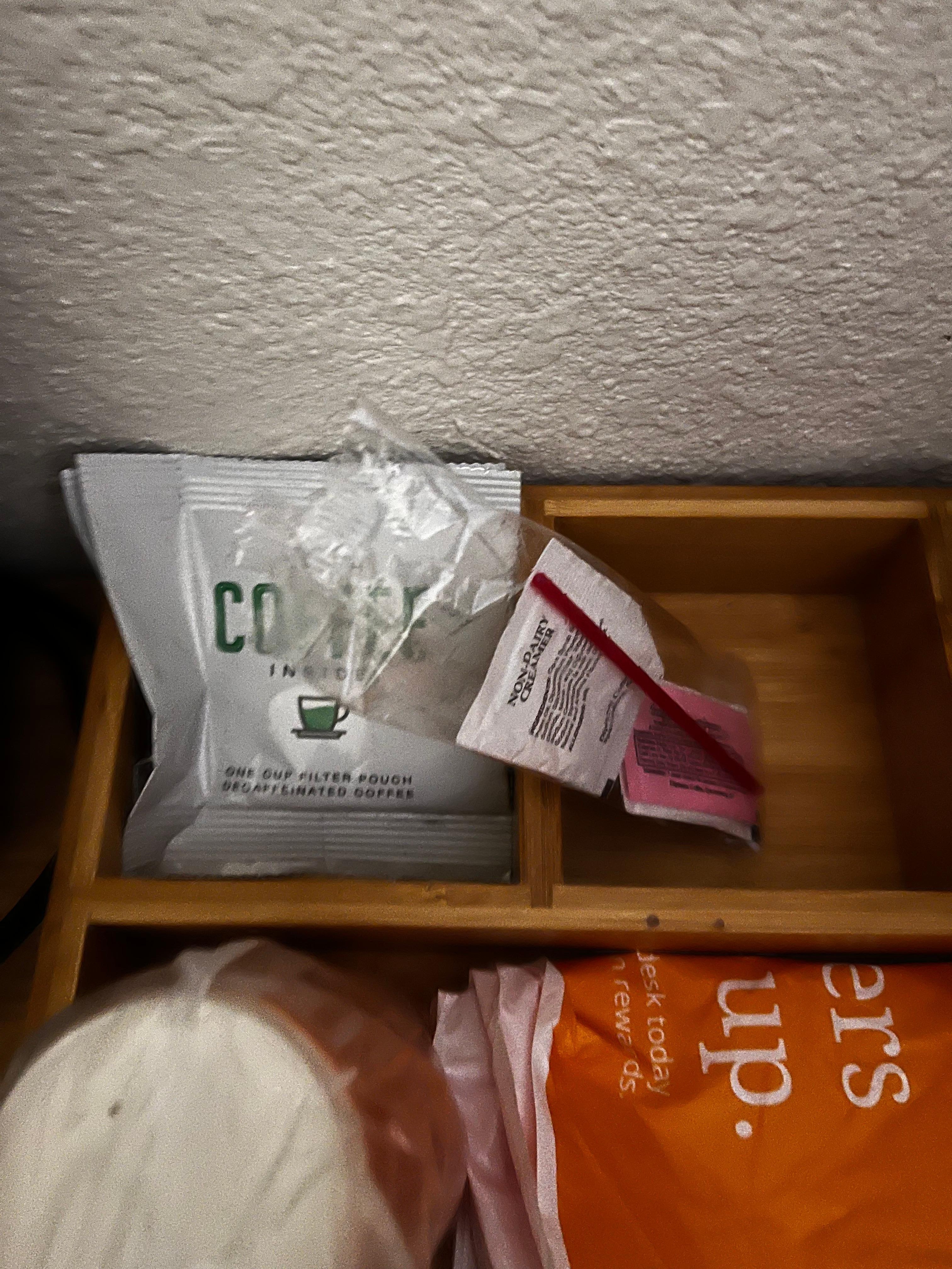 Coffee packs opened and empty at check in