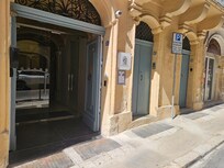 Hotel Main door entrance, keypad access on right.
Two apartment main doors to right. (Note: current good images are out of date)
