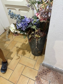 Cracked and glued flower pot in hall