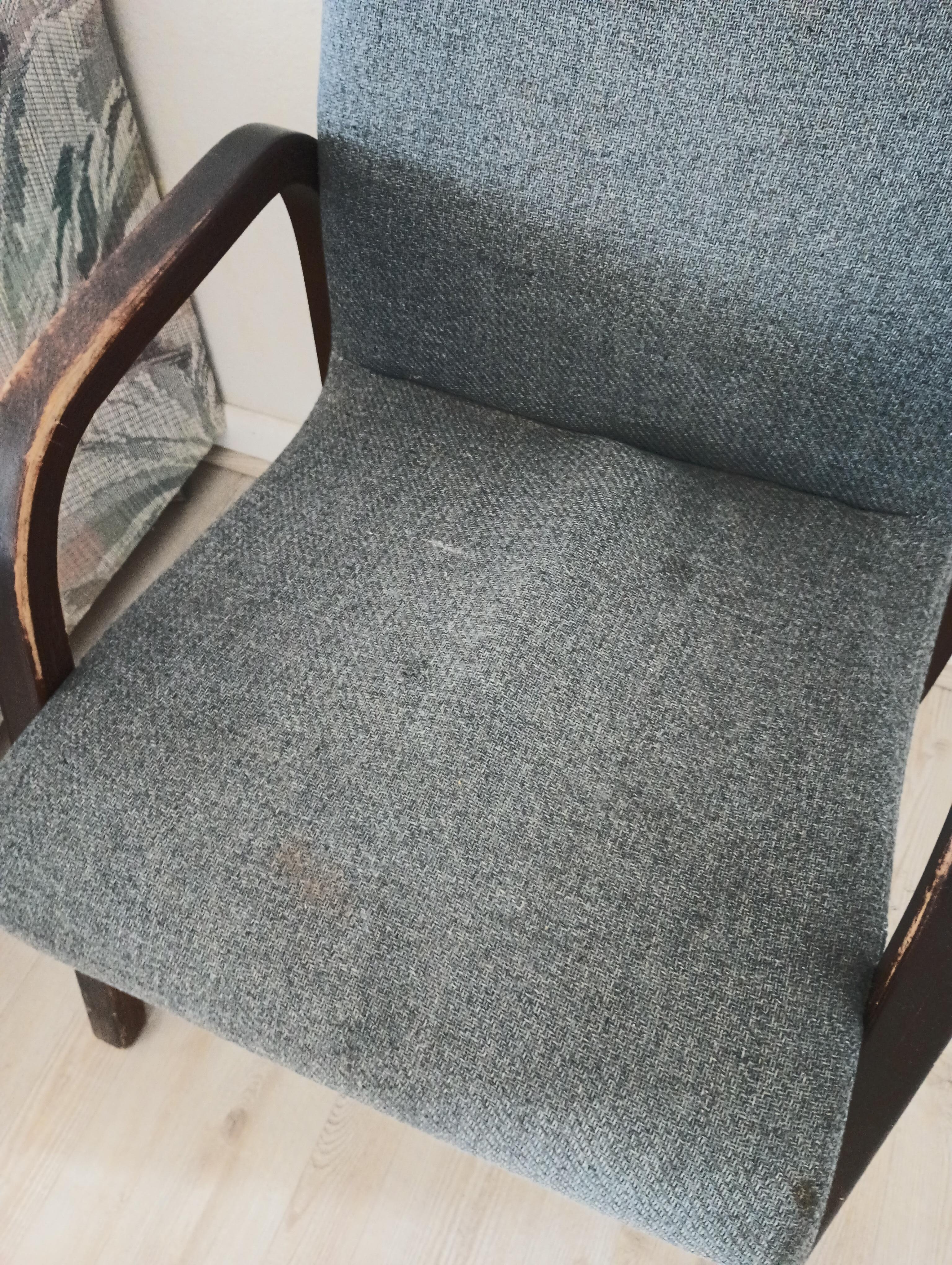 Stained and warped chair 